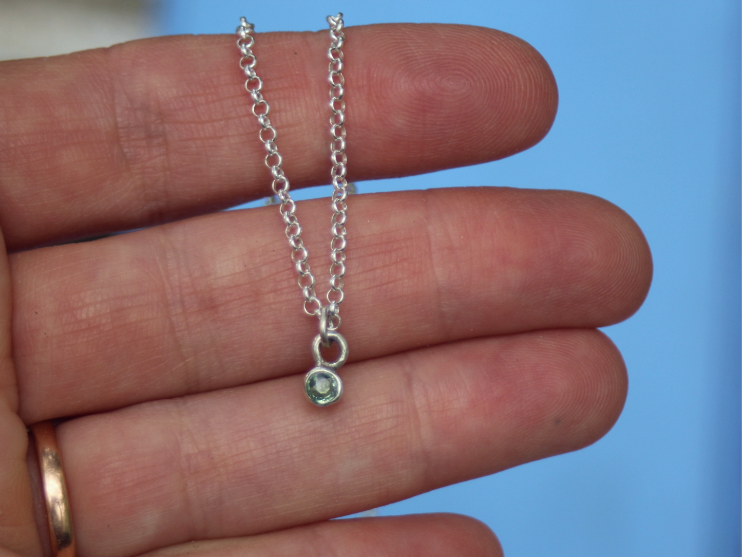 Little Sparkler necklace with reclaimed green sapphire